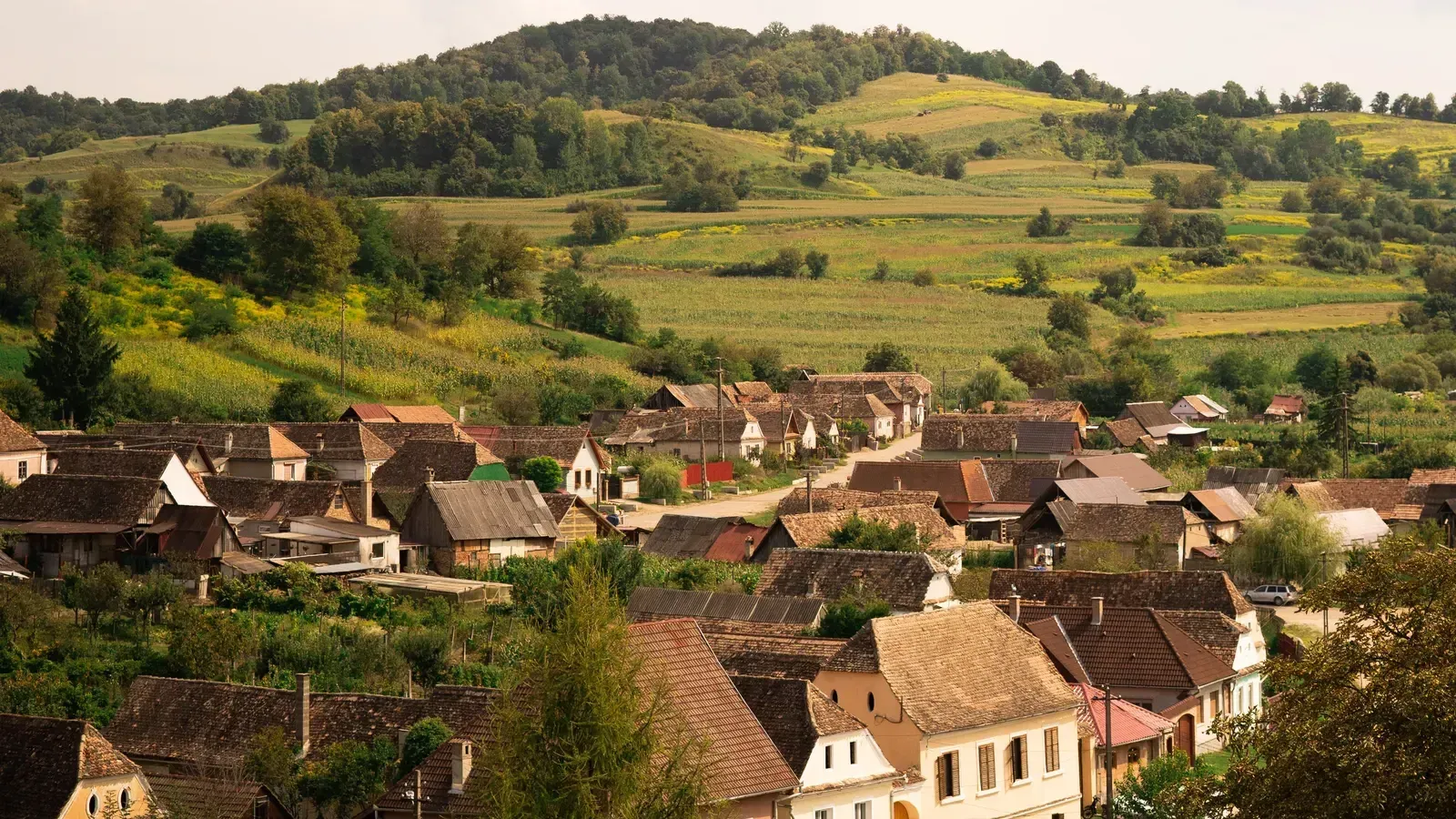 The Saxon village of Biertan among green hills in Transylvania