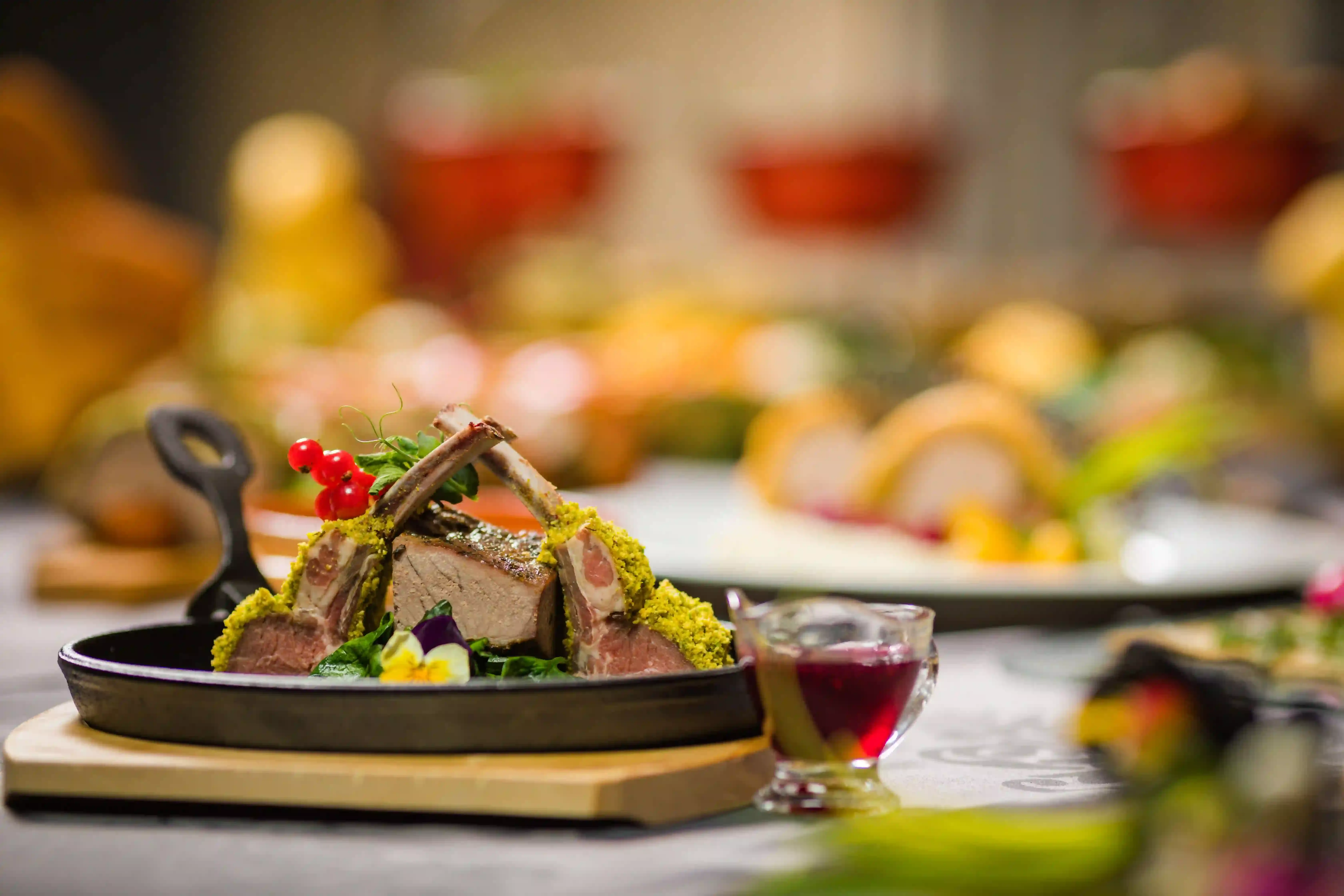 Gourmet Romanian lamb dish served in a cast-iron pan