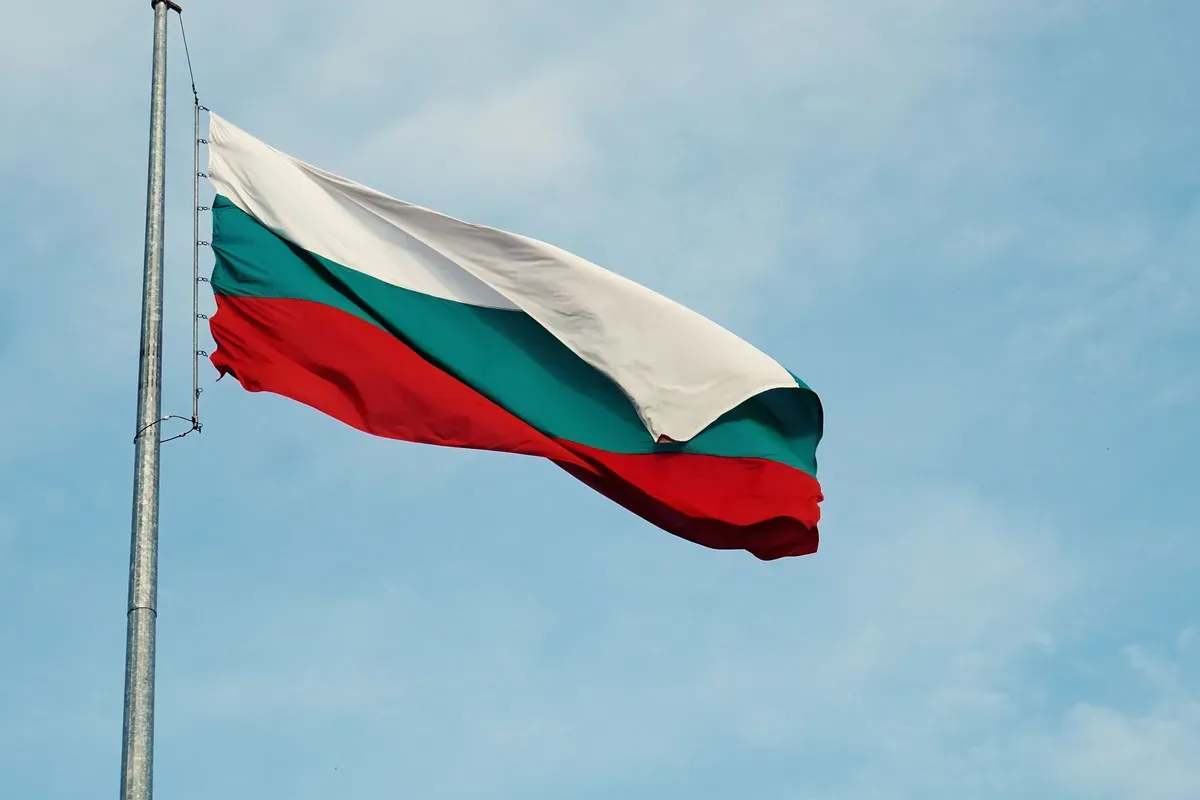 Flag of Bulgaria waving against a blue sky