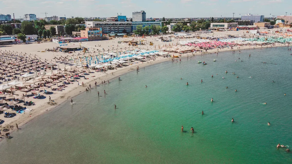 Wide sandy beach and turquoise water on Romania’s Black Sea coast