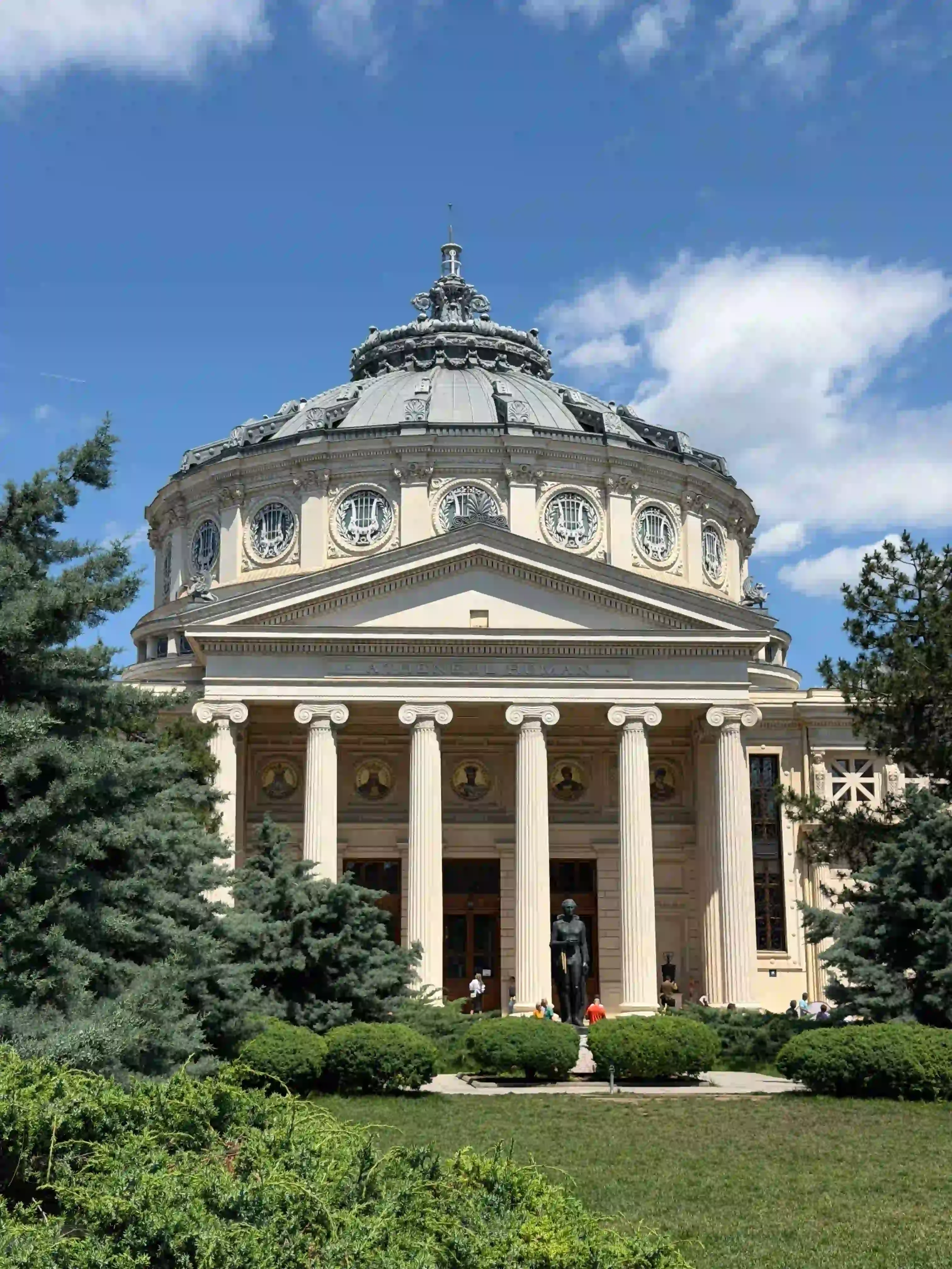 Neoclassical domed facade of the Romanian Athenaeum in Bucharest