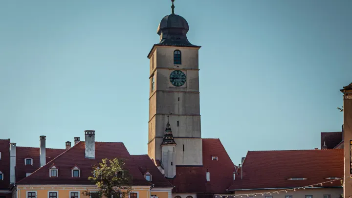 The Council Tower of Sibiu rising above the red rooftops of the old town